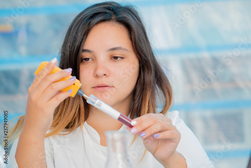 Testing wine in quality control lab photo