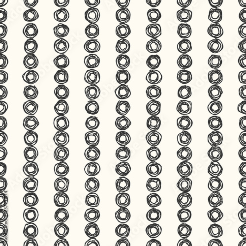 Monochrome hand drawn seamless pattern. Grid of hatched circles. Vector illustration