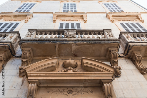 Soller, Mallorca, Spain - July 20, 2013: Old house balcony. View of the streets of Soller