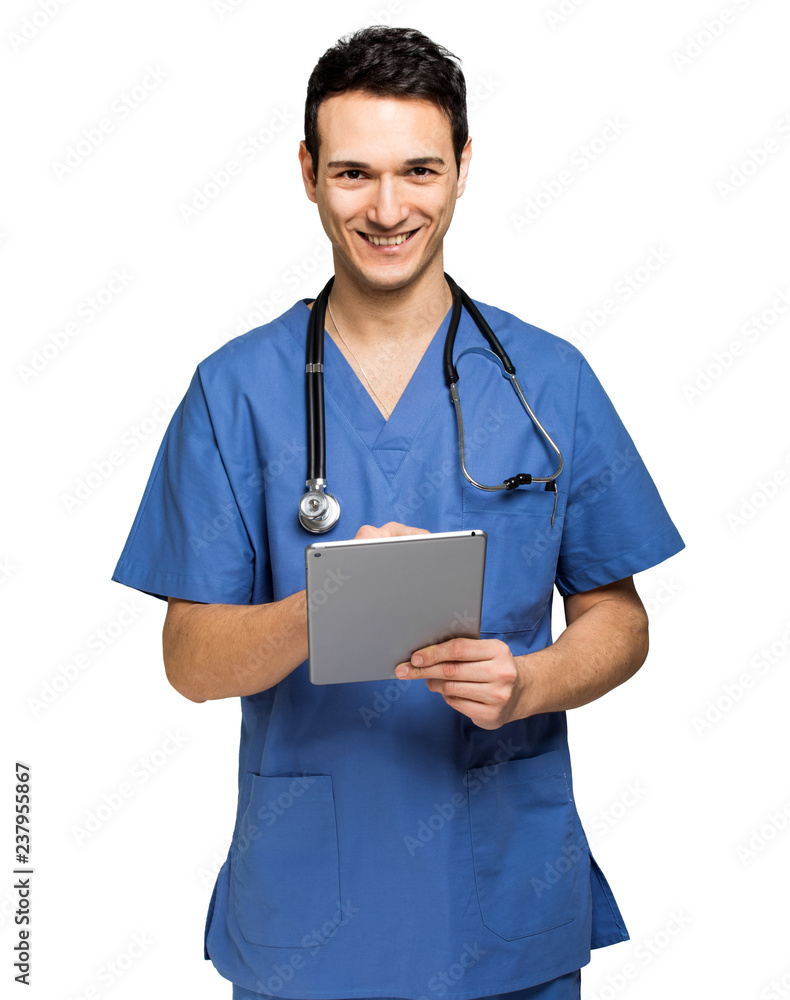 Male nurse isolated on white using a digital tablet Male nurse isolated on white using a digital tablet