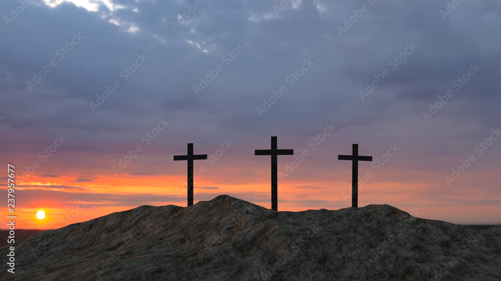 three crosses on top of a hill at sunset