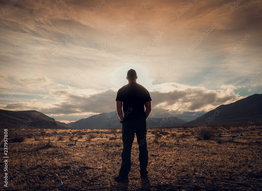 silhouette of man outdoors, in Death Valley National Park at sunset