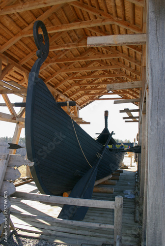 Ancient scandinavian viking drakkar view from the stern with steering oar
