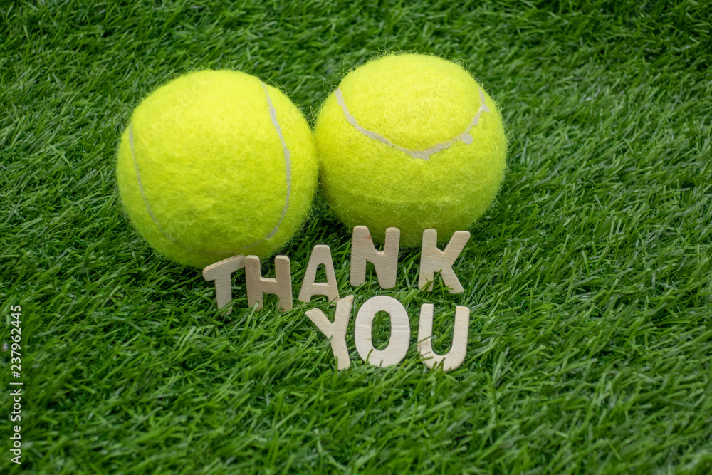 Tennis Thank you sign on green grass