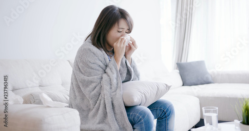 woman sick and sneeze