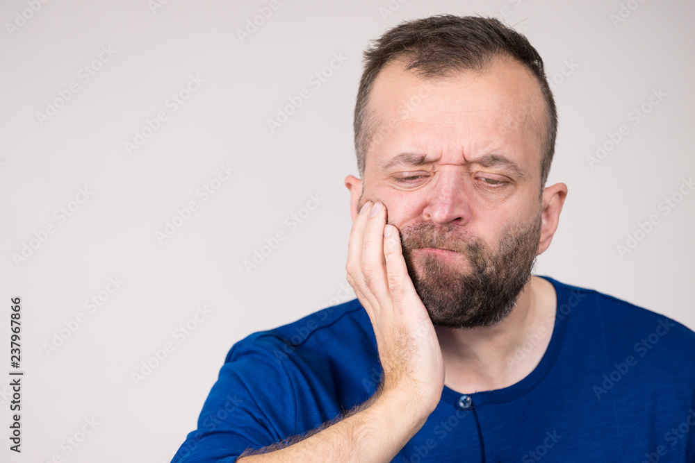 Man having tooth pain Man having tooth pain