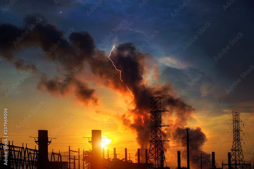 Factory - oil and gas industry Dramatic sky sunset and lightning