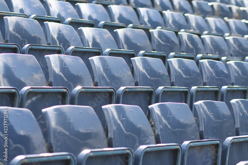 rows of empty seats in stadium