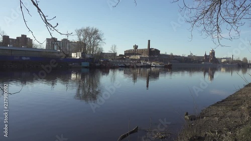 St. Petersburg. A view of Church of the Epiphany through the Ekaterengovka River in sunny day photo