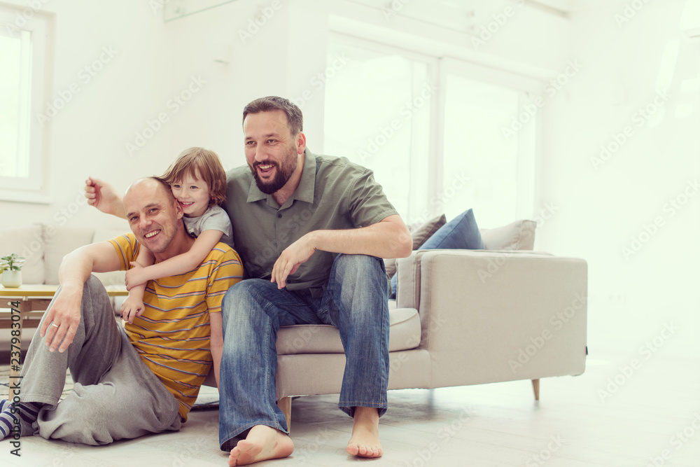 Portrait of male gay couple with adopted childre Portrait of male gay couple with adopted childre