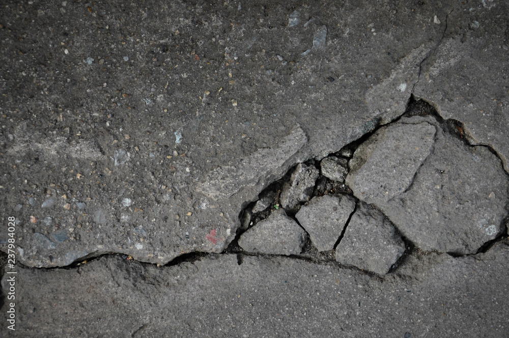 Obraz premium Asphalt road with crack background
