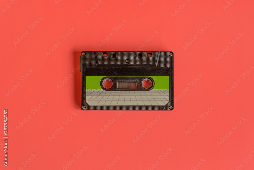 Audio cassette tape on pastel colored background. Retro style. Audio cassette tape on pastel colored background. Retro style.