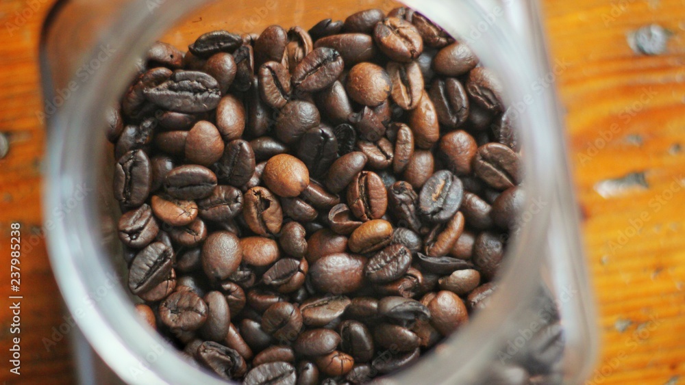 Fototapeta premium coffee beans in a cup