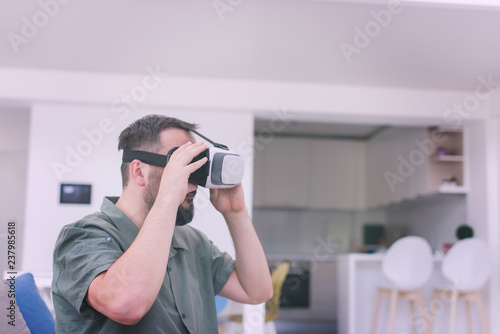 man with beard trying vr glasses