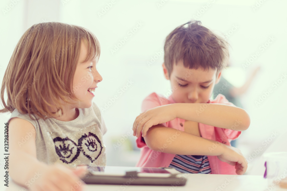 cute little brother and sister having fun at home cute little brother and sister having fun at home