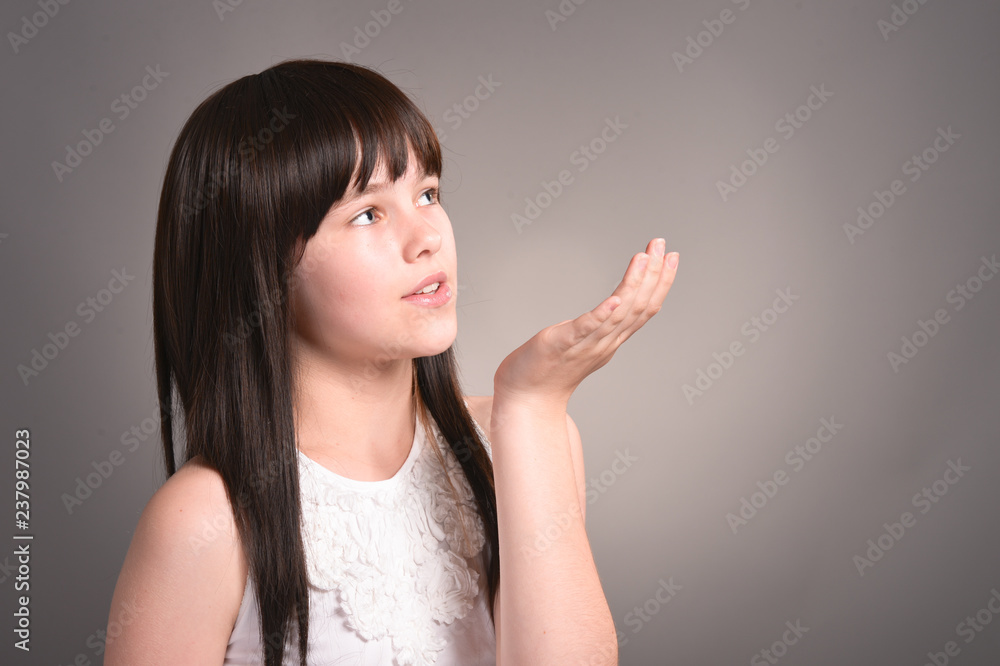 Beautiful cute girl with dark hair posing Beautiful cute girl with dark hair posing