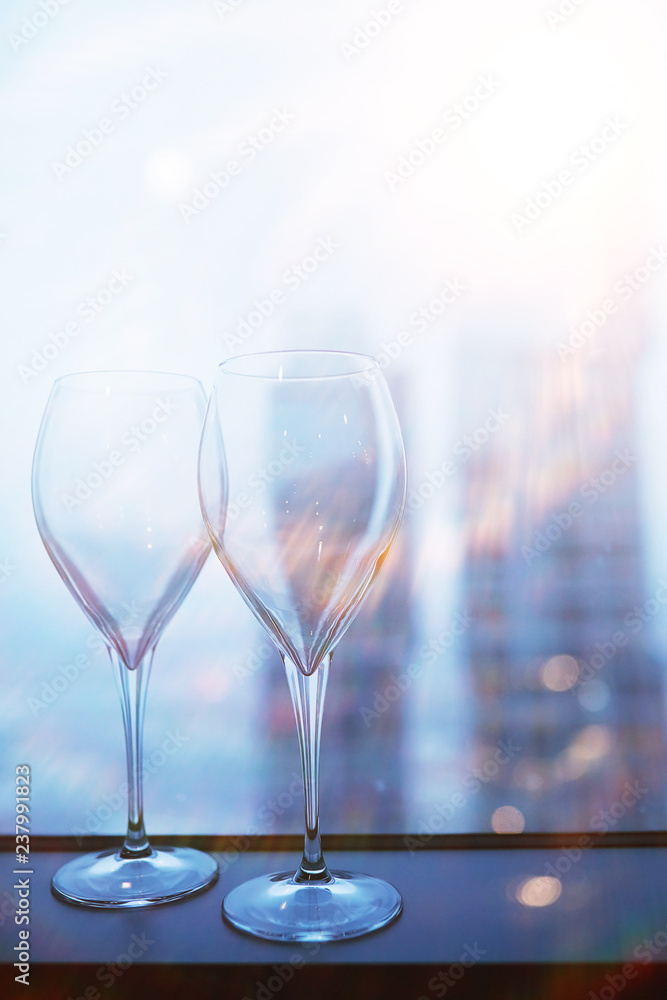 Cocktail glasses on the windowsill by the glass Cocktail glasses on the windowsill by the glass
