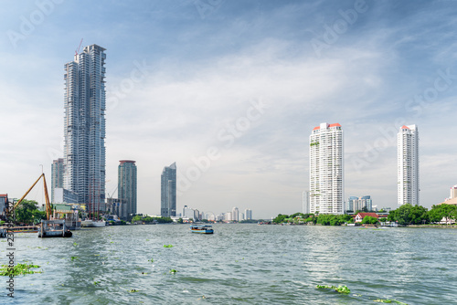 The Chao Phraya River and high-rise residential buildings