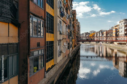 Girona landmark in Catalonia. Urban scene of river facade houses and water reflection © jordieasy