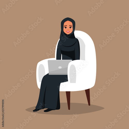 Young arab girl sitting in comfortable armchair with laptop. Muslim business woman wearing hijab working at home or in office. Colored vector illustration in flat cartoon style.