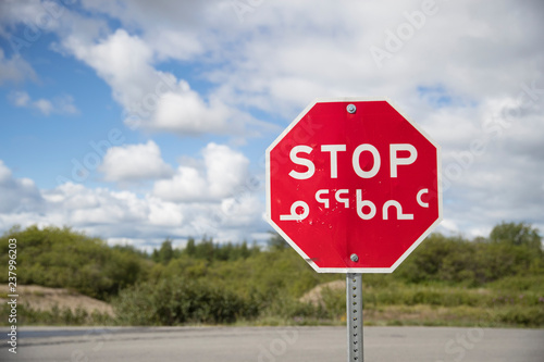 Stop sign translated in Inuit language