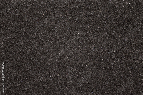 Black foam texture board. Soft rubber material background.