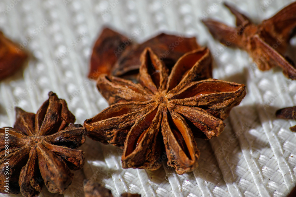Anise stars aromatic asian spices on a rustic vintage background Anise stars aromatic asian spices on a rustic vintage background
