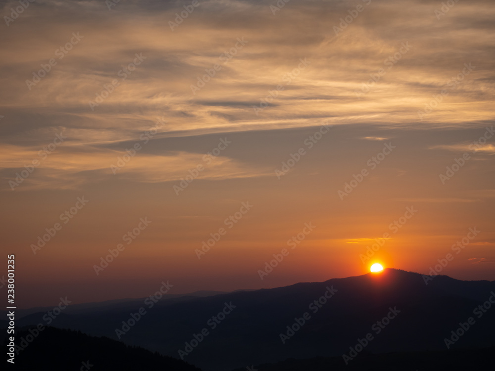 Western Beskids at Sunset. Gorce Mountains and Mount Luban. View from Mount Jarmutka, Pieniny, Poland.