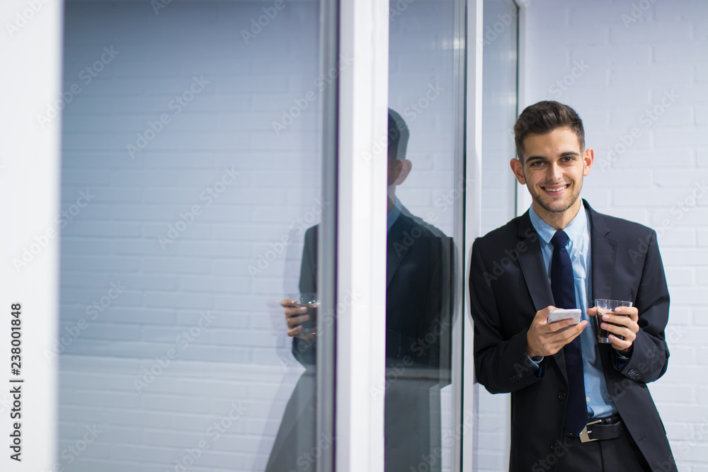 business man with mobile phone and coffee mug business man with mobile phone and coffee mug