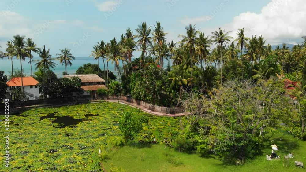 Stunning aerial drone video of tropical beach on the Bali island. Stunning aerial drone video of tropical beach on the Bali island.
