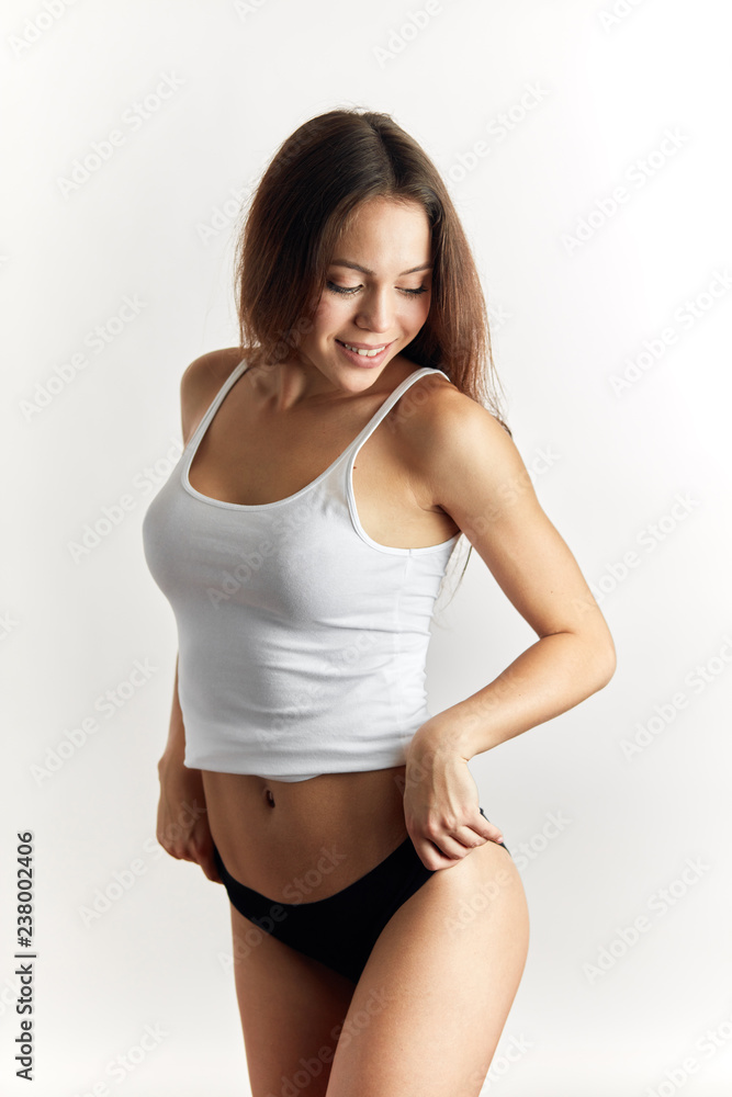 cheerful fit girl showing her healthy smoothy tan. close up portrait. joyful girl having fun cheerful fit girl showing her healthy smoothy tan. close up portrait. joyful girl having fun