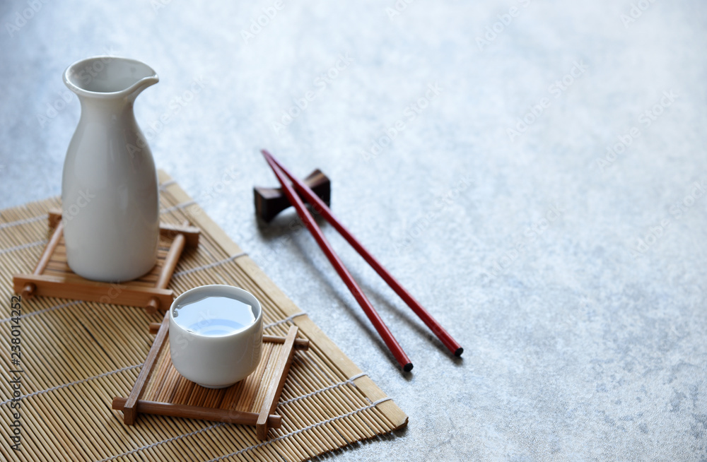 japanese sake set oriental drink style and chopsticks on the table japanese sake set oriental drink style and chopsticks on the table
