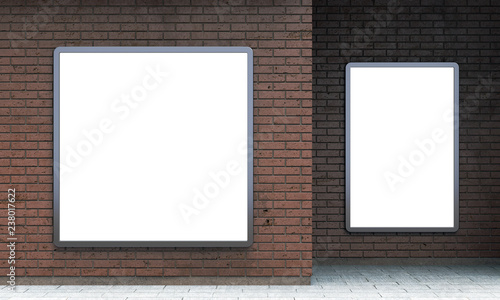 Blank lightboxes or street LCD panels on brown brick wall