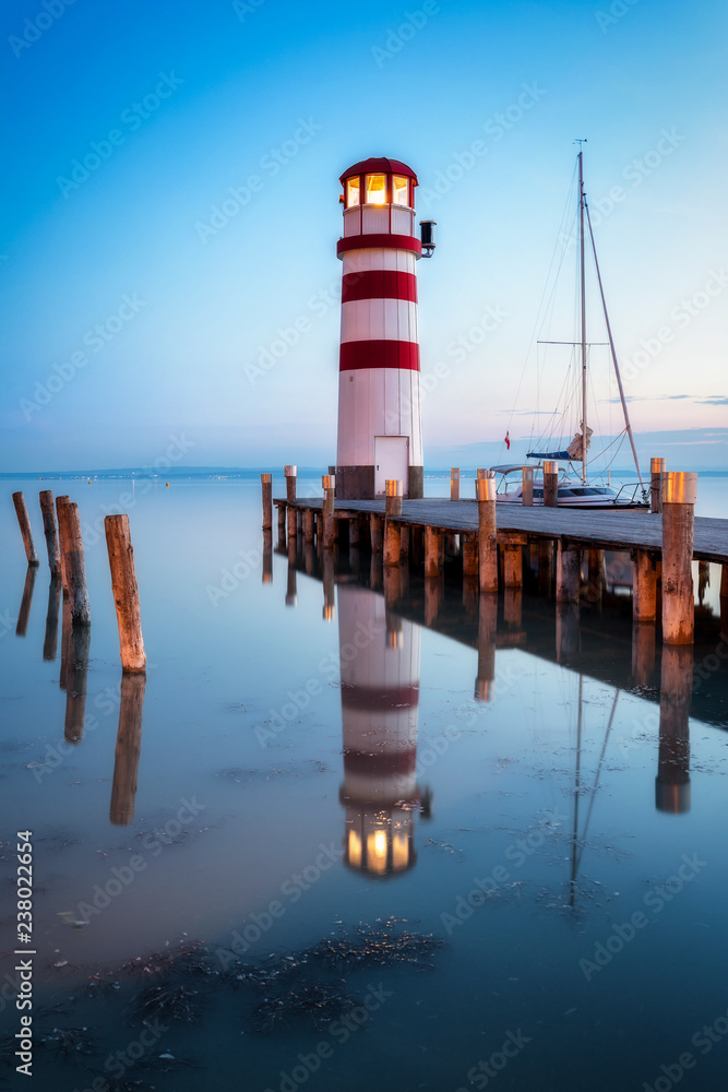 Obraz premium Lighthouse at sunset, Podersdorf am see, Austria