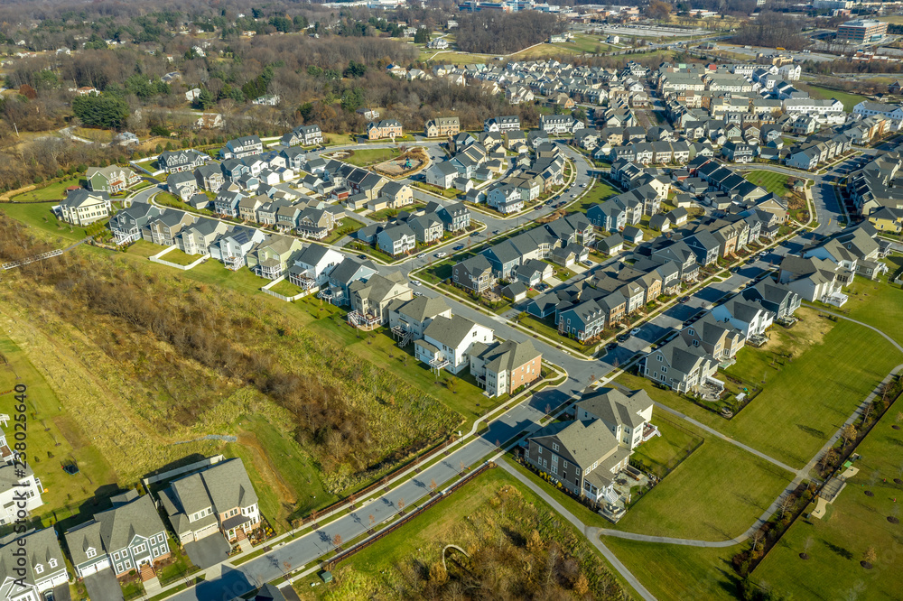 Aerial view of typical american colonial single family luxury home real estate neighborhood for upper middle class families in the USA