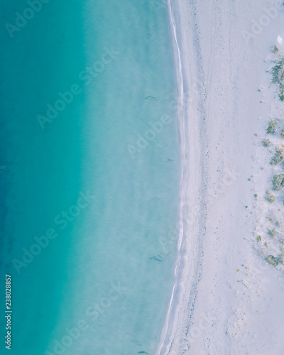 Calm ocean and white sand