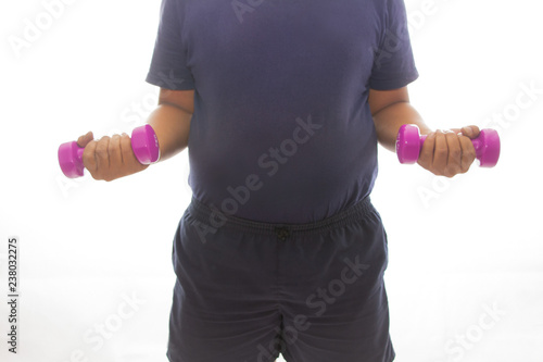 Concept fitness for fat man, fat man shows his muscle while holding dumbbell in hand photo