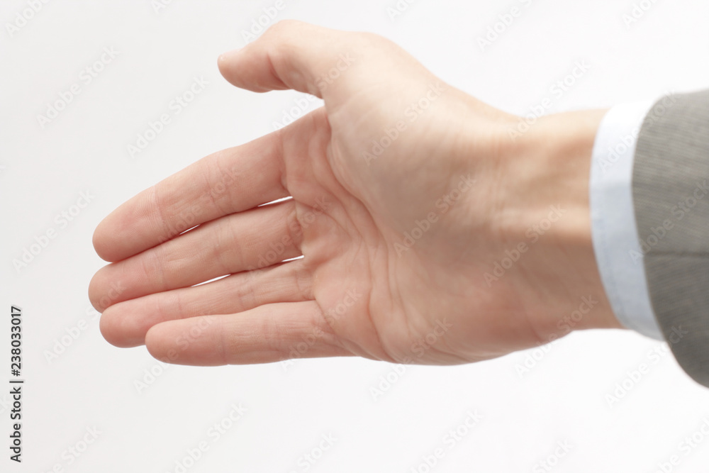 closeup .hand of a businessman, outstretched for a handshake