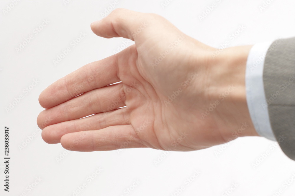 closeup .hand of a businessman, outstretched for a handshake closeup .hand of a businessman, outstretched for a handshake