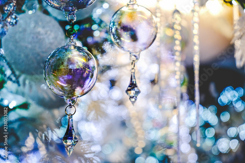 crystal ball christmas tree decoration blue background elegant closeup