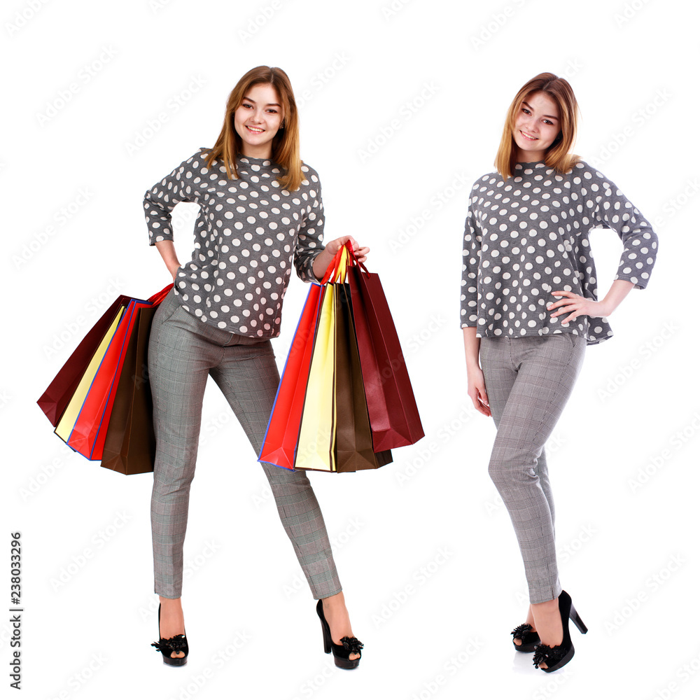Young beautiful blonde woman in gray trousers Young beautiful blonde woman in gray trousers
