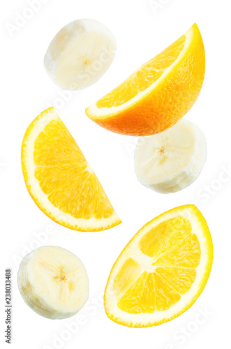 Flying banana slices with orange slices