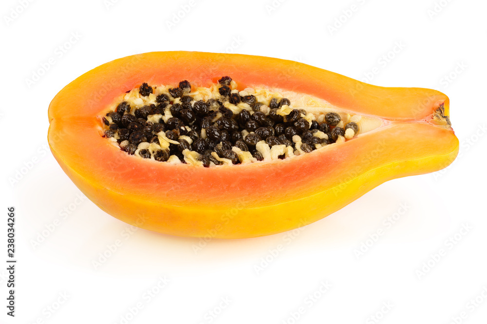 half of ripe papaya isolated on a white background half of ripe papaya isolated on a white background