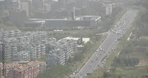 4k china urban city busy traffic jams,highway street & business houses building,air pollution.
