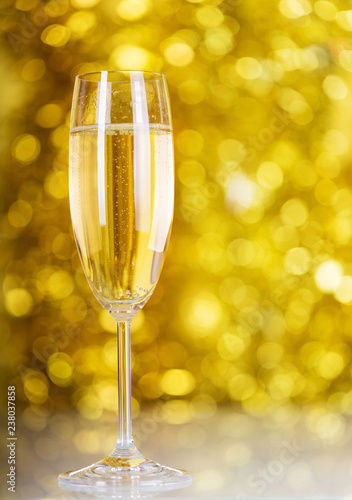 New year's champagne bubbles on a bright yellow background