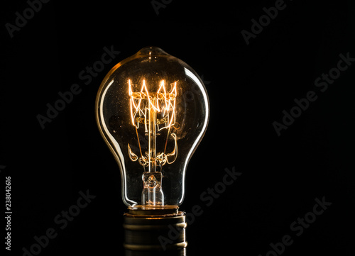 Photography Edison's light bulb illuminates from electric current