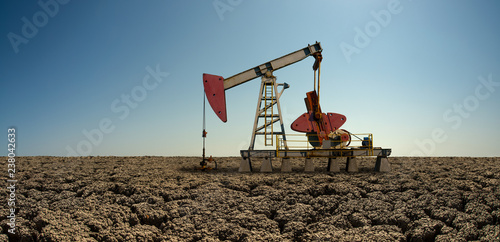 oil derrick pumping crude © tankist276