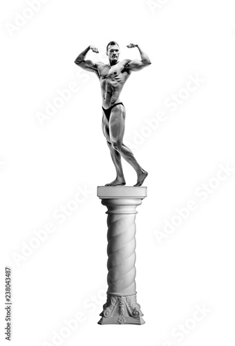man bodybuilder pose on pedestal