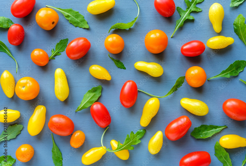 Pattern of red and yellow tomatoes with chicory Pattern of red and yellow tomatoes with chicory