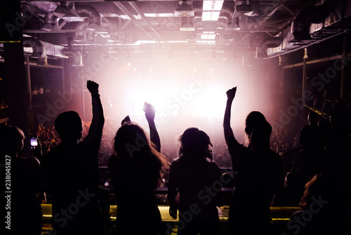 People at the concert watching music show from the balcony